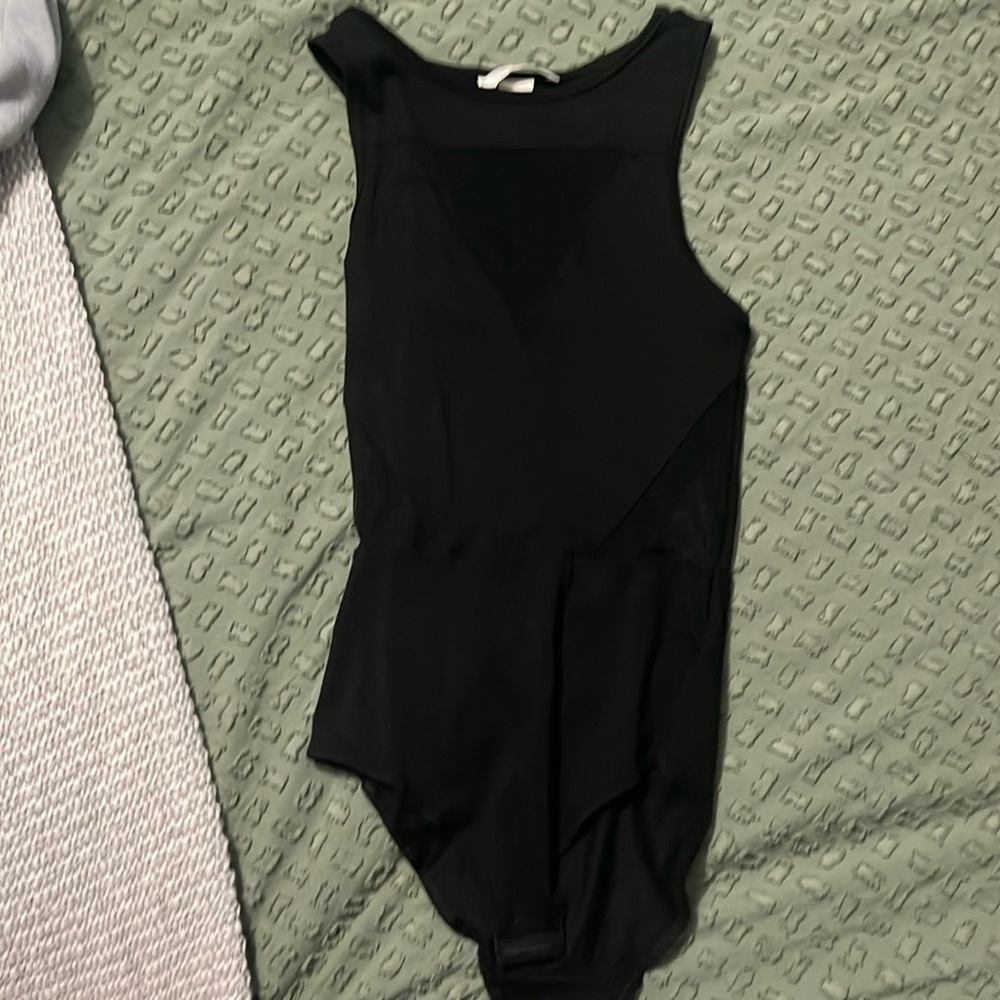Black body suit with sheer cut outs